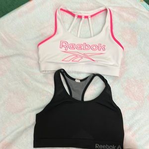 Two Reeboks sports bras, on padded, size M medium